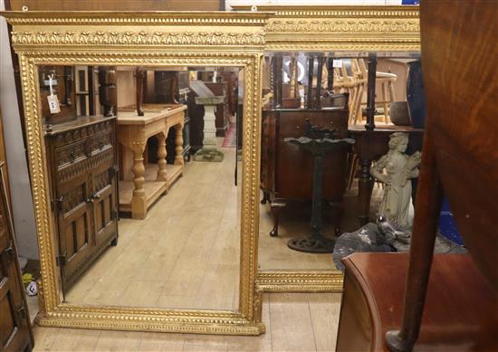 A pair of French giltwood and gesso overmantel mirrors H.139cm